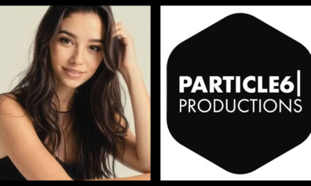 Split graphic featuring a smiling woman with long, wavy brown hair on the left, and a black hexagonal logo on the right containing white text that reads "PARTICLE 6 PRODUCTIONS".