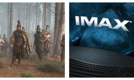 A split image promoting the film The Odyssey. On the left, ancient Greek soldiers in bronze armour and feathered helmets march through a misty pine forest. On the right, the silver "IMAX" logo hovers in a starry, blue space backdrop above an empty cinema hall.