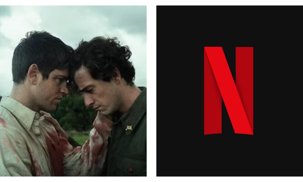Two men with dark hair standing close outdoors under an overcast sky, with their foreheads touching; the man on the left wears a blood-stained light shirt, and the Netflix red "N" logo appears on a black background to the right.