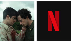 Two men with dark hair standing close outdoors under an overcast sky, with their foreheads touching; the man on the left wears a blood-stained light shirt, and the Netflix red "N" logo appears on a black background to the right.
